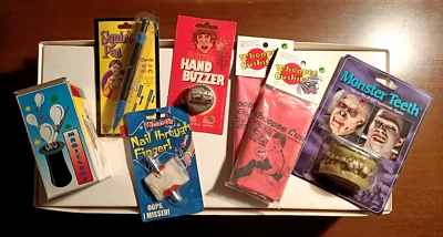 Set of 7 Novelty Gag Toys - Monster Teeth, Hand Buzzer, Magic Globe, Whooppee - image 1 of 4