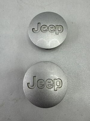 Tapacubos central de rueda Jeep Wrangler Liberty Patriot 2007-17 OE 52090401AB Foto 1 de 4