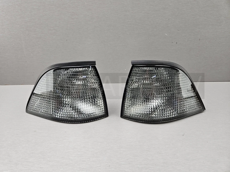 NEW GENUINE TYC BMW E36 COUPE CABRIO TURN INDICATOR FRONT PAIR SMOKED DARK - Image 1 of 4