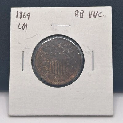 1864 LM Uncirculated 2 Cent Piece. RB Uncirculated. In Paper Coin Holder. - Image 1 of 2
