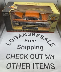 JADA 10° ANNIVERSARIO 1957 CHEVY BEL AIR 1:24 NERO/ARANCIONE - Foto 1 di 20