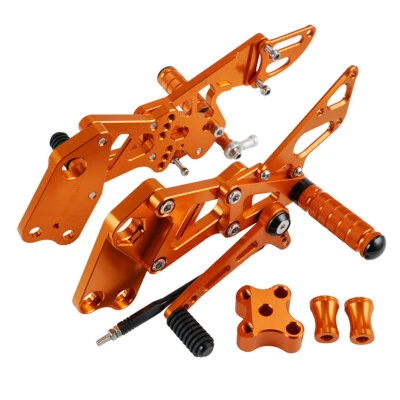 Reposapiés CNC naranja Racing estriberas reposapiés para KTM RC390/200/125 2014-2021 Foto 1 de 4
