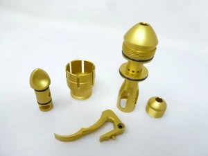 KIT DE ACENTO TINTE DM5 TAPA DE PERNO LPR GATILLO CUELLO DE ALIMENTACIÓN TAPÓN POLVO AMARILLO ORO MATRIZ - Imagen 1 de 3