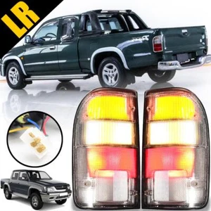 FANALI POSTERIORI FANALI POSTERIORI LENTE TRASPARENTE PER TOYOTA HILUX MK4 TIGER D4D 1998-04 LR - Foto 1 di 10