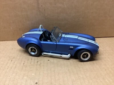 Coche modelo Shelby Cobra 427S/C Road Legends 92058 1964 1:18 sin caja. Foto 1 de 4