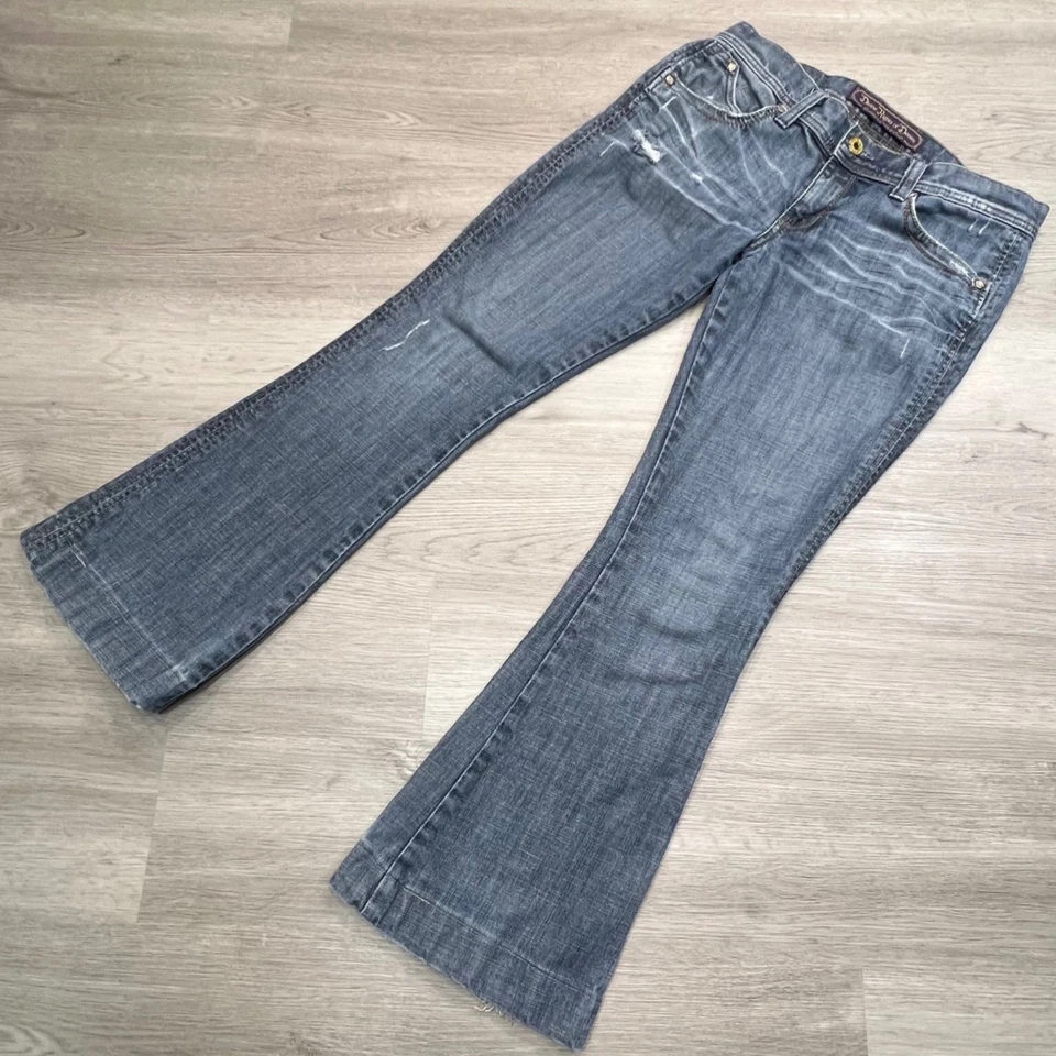 Pantalones de mezclilla Divine Rights of talla 30 tiro bajo súper acampanados desgastados Foto 1 de 4