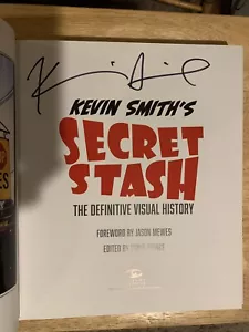 Kevin Smith's Secret Stash Signed By KEVIN SMITH HC + PIC - Picture 1 of 7