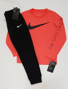 orange and black nike outfit