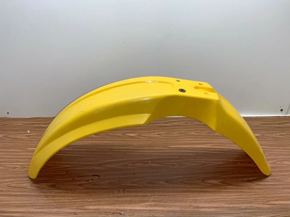Guardabarros delantero de plástico Suzuki RM125 1999 53111-27C02-25Y Foto 1 de 4
