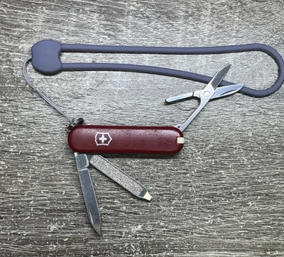 Victorinox Classic SD Swiss Army Knife 58mm, Red, W/ Rubber Wrist Layered Gray - Image 1 of 4