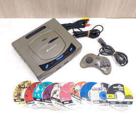 Sega Saturn Japanese Gray console bundle with 10 games & 1 controller tested