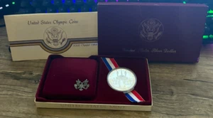 1984-S United States Olympic Coin XXIII Olympiad Silver Dollar OGP and COA - Picture 1 of 5