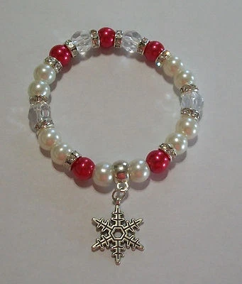 Bonita pulsera de cristal con dije elástico de perlas y copos de nieve, elección de 5 colores Foto 1 de 4