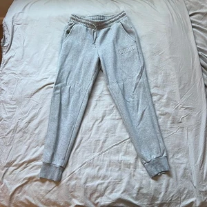 Felpa PUMA Jogger uomo grigio medio logo in rilievo palestra allenamento corsa - Foto 1 di 14
