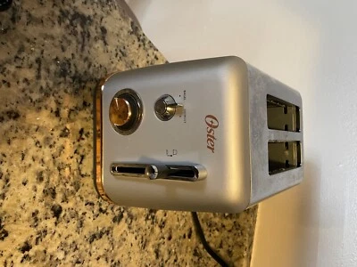 Tostadora Oster Ranura Extra Ancha Oro Rosa/Plata 9 Ajustes de Tono Únicos 2 Rebanadas Foto 1 de 3