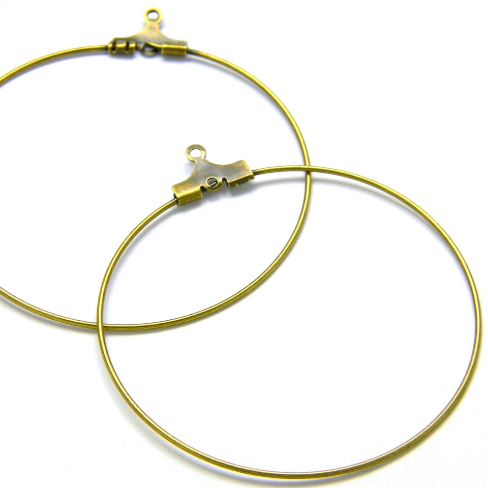 2 fornituras grandes de araña de aro redondo de metal chapado en bronce antiguo de 40 mm Foto 1 de 1