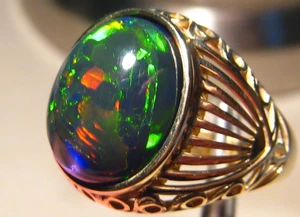 6.6 ct.  Black Ethiopian opal  ring , solid 14k Yellow  gold  , Brightness 5+ - Picture 1 of 10