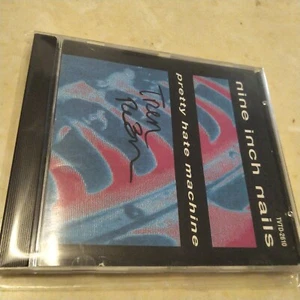 SIGNED Nine inch nails - Pretty Hate machine CD autograph - Picture 1 of 2