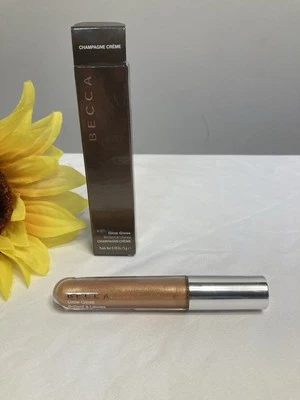 Becca Glow Gloss Champagne Creme 0.18oz New In Box - Image 1 of 4