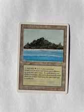 Tropical Island Revised Dual Land Reserved List MTG NM Gradable?
