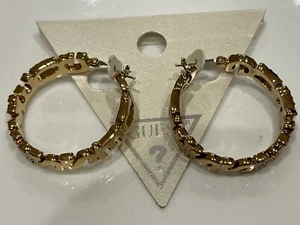 Guess Beautiful Design Gold and Logo Crystal Paved Hoop Earrings - Picture 1 of 4