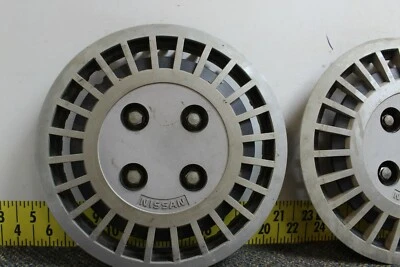 Juego de 4 tapacubos de rueda de 13" OEM 999JWB5000 1982-86 Nissan Sentra (1956) Foto 1 de 4
