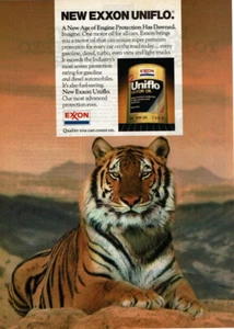 Anuncio impreso vintage 1984 nuevo aceite de motor Exxon Uniflo Tiger acostado en motor Desert - Imagen 1 de 2