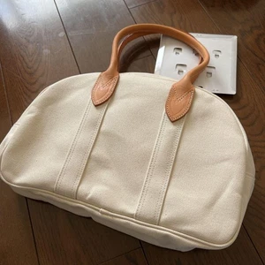 Bolso de mano Yoshida Porter de lona blanco para mujer de Japón - Imagen 1 de 6