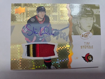 2023-24 Upper Deck Ice Gold Patch Auto Tim Stutzle 26/49 4 color patch - Image 1 of 3