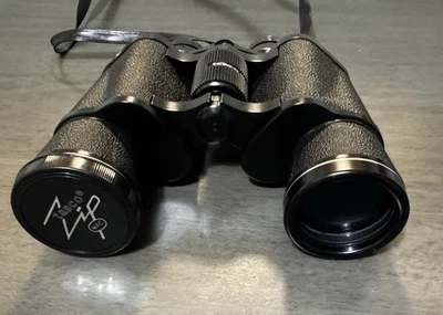 Binoculares Tasco vintage con cremallera - diseño clásico, falta una tapa de objetivo Foto 1 de 4