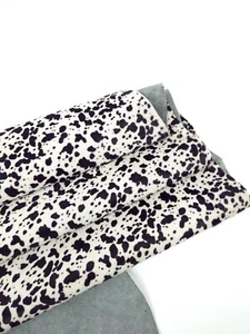 Black and White Spotted Cow Hair on Hide Genuine Leather - Picture 1 of 3