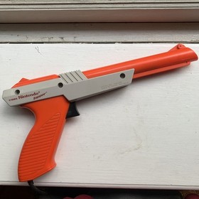 NINTENDO NES ZAPPER LIGHT GUN CONTROLLER ORANGE OFFICIAL OEM NES-005