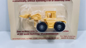 IHC #914 HO Scale Frontlader Traktor mit Messer - Bild 1 von 5