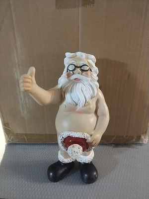 Estatua de resina de Papá Noel sin envolver, vacaciones de Navidad Foto 1 de 4