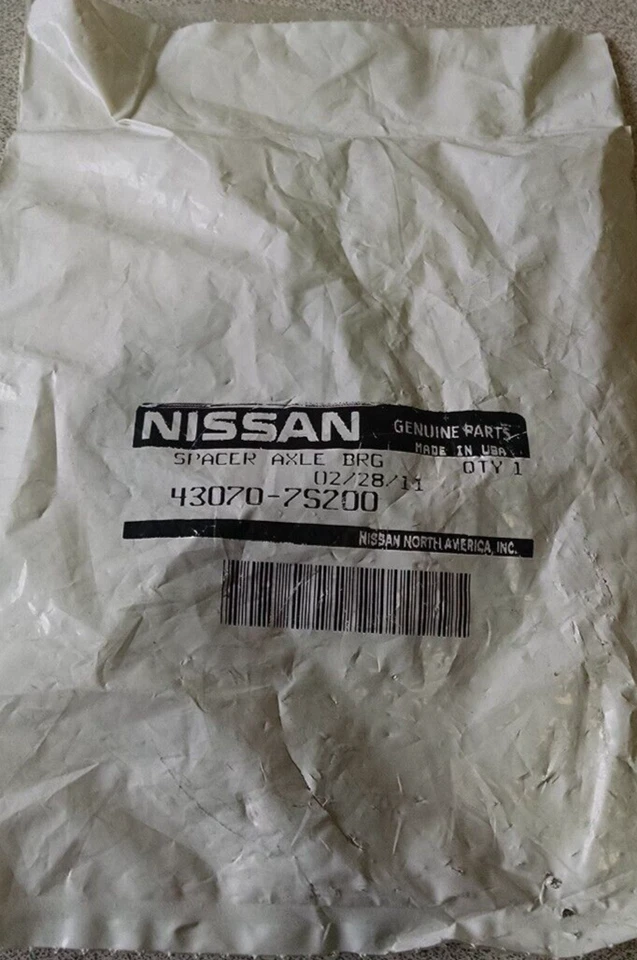 Espaciador de sello de cojinete de eje trasero OEM 04-20 Nissan FRONTIER XTERRA TITAN 43070-7S200 Foto 1 de 1