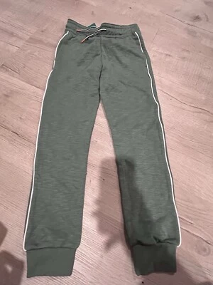 Pantalones deportivos a rayas H&M verde salvia/blanco para niños/niñas. Talla 7/8. Nuevo  Foto 1 de 4
