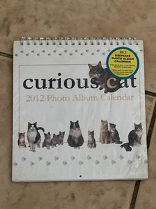 sealed 2012 Curious Cat Keepsake Photo Album Calendar (spiral bound book)