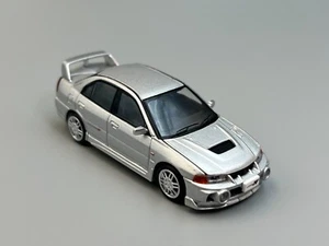 Mitsubishi Lancer Evolution IV silber mit Motor Maßstab 1:64 Poprace - Bild 1 von 17