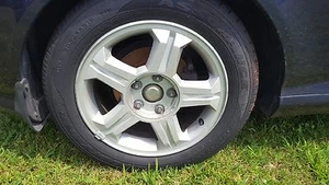 HYUNDAI TIBURON PASSENGER RIGHT REAR TIRE RIM GOODYEAR ASSURANCE 205/55R16 2004 - Picture 1 of 7