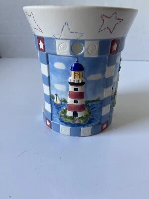 Vela Yankee Wamer de cera roja blanca y azul con barcos faro náutico Foto 1 de 4