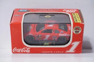 1997 COCA COLA 600 (1 OF 10,080) CHEVROLET MONTE CARLO 1:64 WITH STAND REVELL - Image 1 of 4