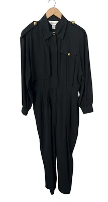 Mono vintage años 90 OS International negro dorado detalle 11/12  Foto 1 de 4