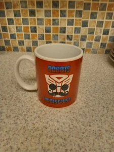 TRANSFORMERS AUTOBOT TAZA BIGOTE ROBOTS DISFRAZADOS 8CM X 9,5CM HASBRO 2013 - Imagen 1 de 4