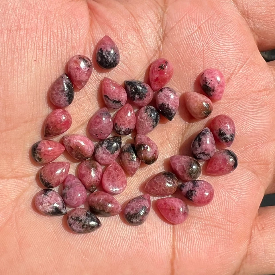 Natural Black Pink Rhodonite Pear 5x7 mm to 18x25 mm Cabochon Loose Gemstone - Image 1 of 4