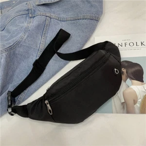 Riñonera negra unisex OctiveSports con orificio para auriculares - Imagen 1 de 2