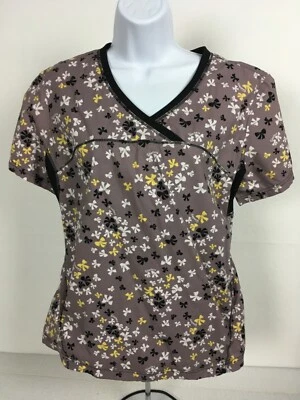 Blusa Médica Sketchers para Mujer Talla M Marrón con Lazos Cuello en V Bolsillos Mangas Cortas Foto 1 de 4