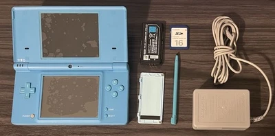 Nintendo DSi Light Blue Handheld Console Game System Fully Functional Complete - Image 1 of 3
