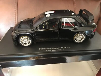 AUTOART 1/18 MITSUBISHI LANCER WRC05 CARROCERÍA LISA VERSIÓN NEGRO 80528 LEER ANUNCIO Foto 1 de 4