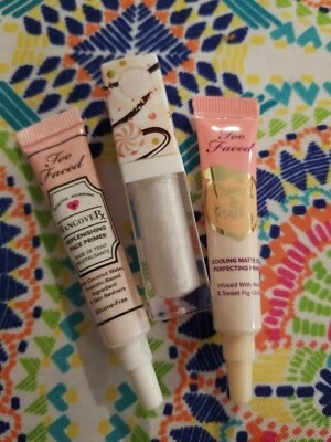 Too Faced Primed & Peachy HangoverX & peppermint bark sprakling lip gloss lot 3 - Image 1 of 4