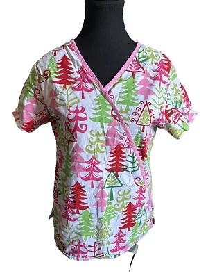 Women’s White Cross Scrub Top Size XSmall Chritmas Tree Pattern w/Pink Accent - Image 1 of 3